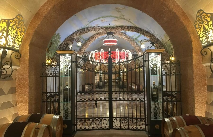 A gate and entrance into the Del Dotto Winery.